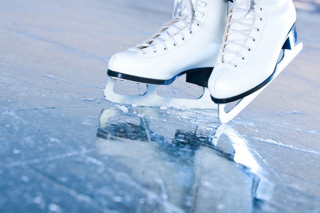 Tilted blue version, ice skates with reflection Ice Skating sportscenter